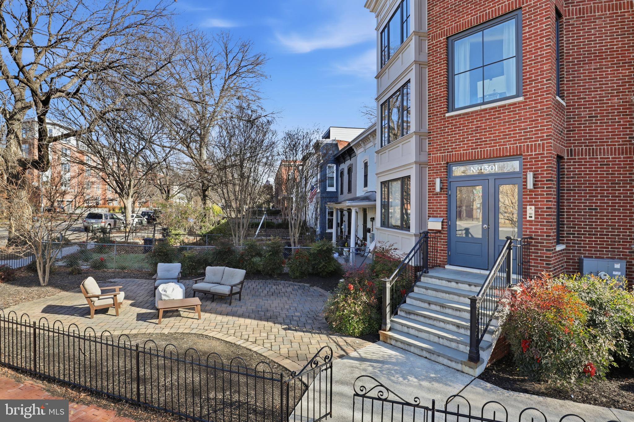 1301 Potomac Avenue Southeast, Unit 2 Washington, DC 20003 - Photo 25 of 30 a view of a patio with couches table and chairs and potted plants