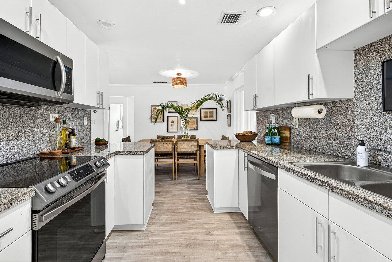 3511 Washington Road West Palm Beach, FL 33405 - Photo 11 of 47 Kitchen to Dining Rm