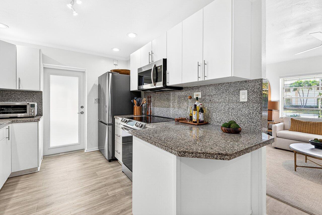 3511 Washington Road West Palm Beach, FL 33405 - Photo 13 of 47 Kitchen to Living Rm