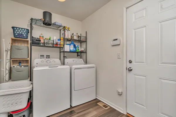 a storage room with washer and dryer