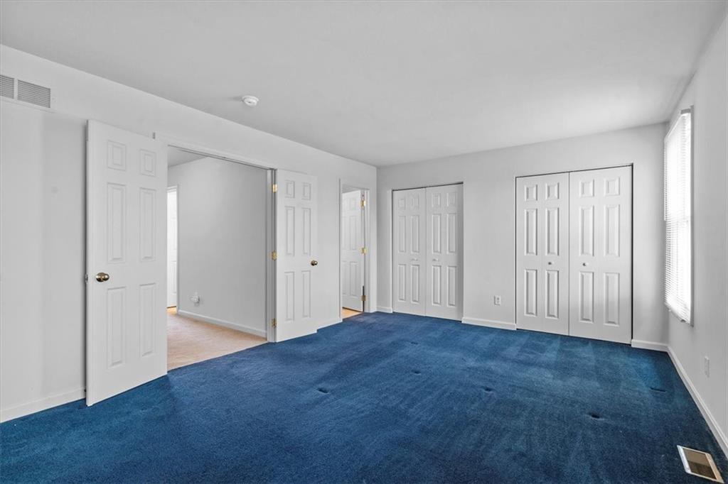 14 Castle View Drive McKees Rocks, PA 15136 - Photo 17 of 28 a view of an empty room with wooden floor and closet area