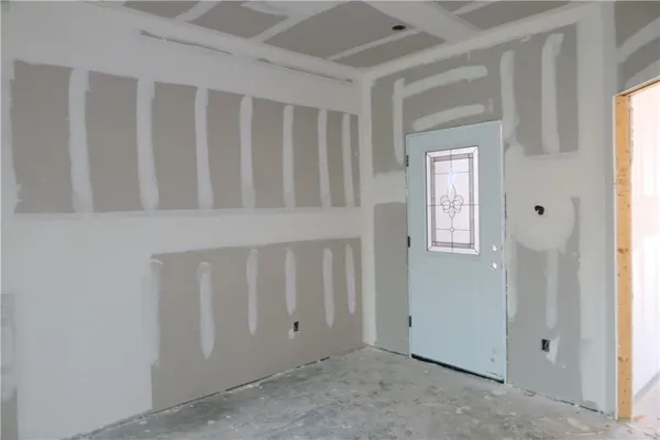 an empty room with windows