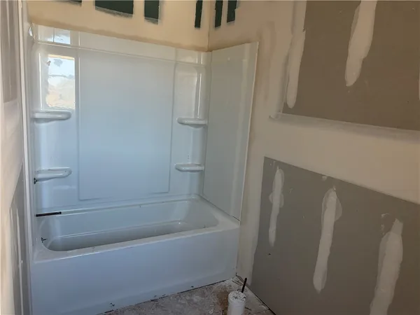 a bathroom with a bathtub