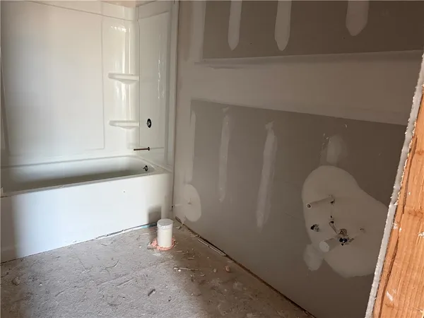 a bathroom with a bathtub