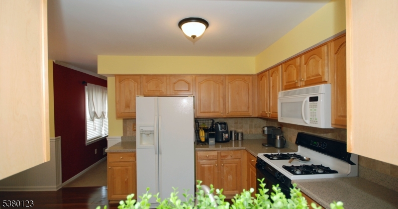32 Peterson Road Hillsborough, NJ 08844 - Photo 11 of 38 a kitchen with refrigerator and stove
