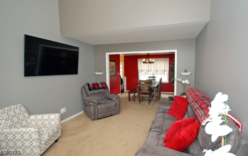 32 Peterson Road Hillsborough, NJ 08844 - Photo 13 of 38 a living room with furniture and a flat screen tv