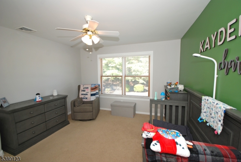 32 Peterson Road Hillsborough, NJ 08844 - Photo 22 of 38 a bedroom with furniture and a window