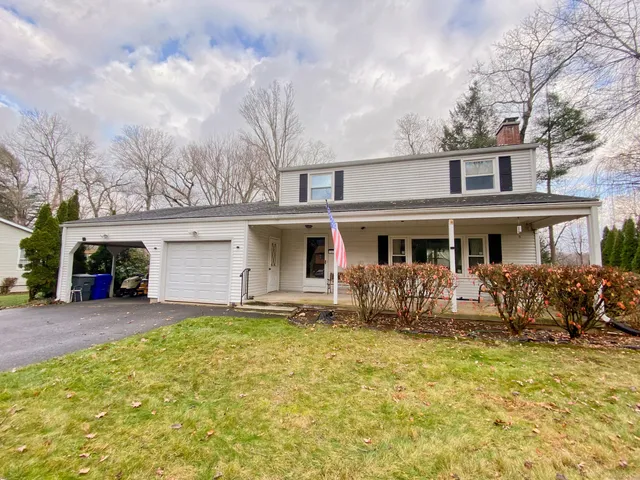 a front view of house with yard outdoor seating and barbeque oven