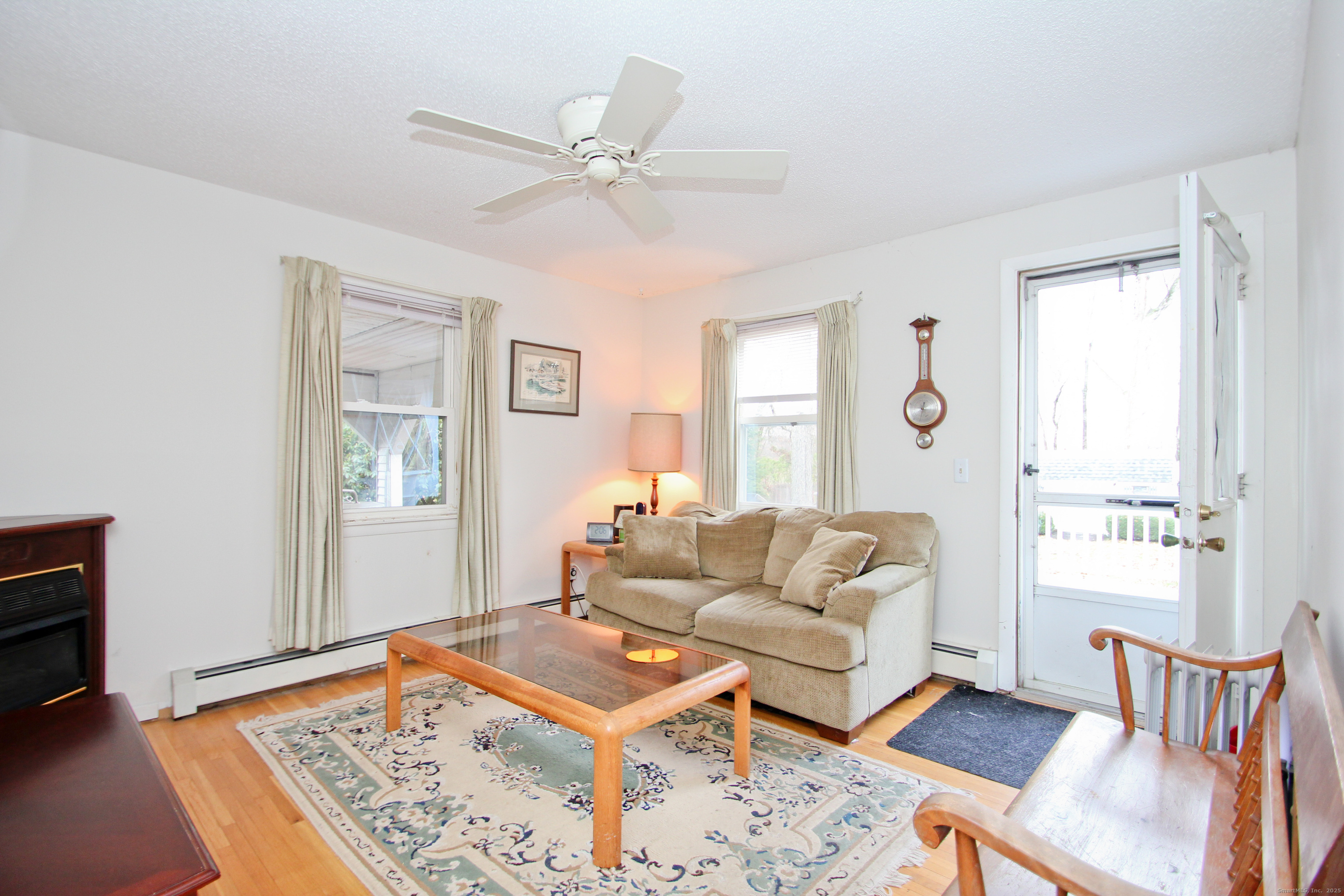 11 Northfield Road Enfield, CT 06082 - Photo 15 of 34 a living room with furniture and a window