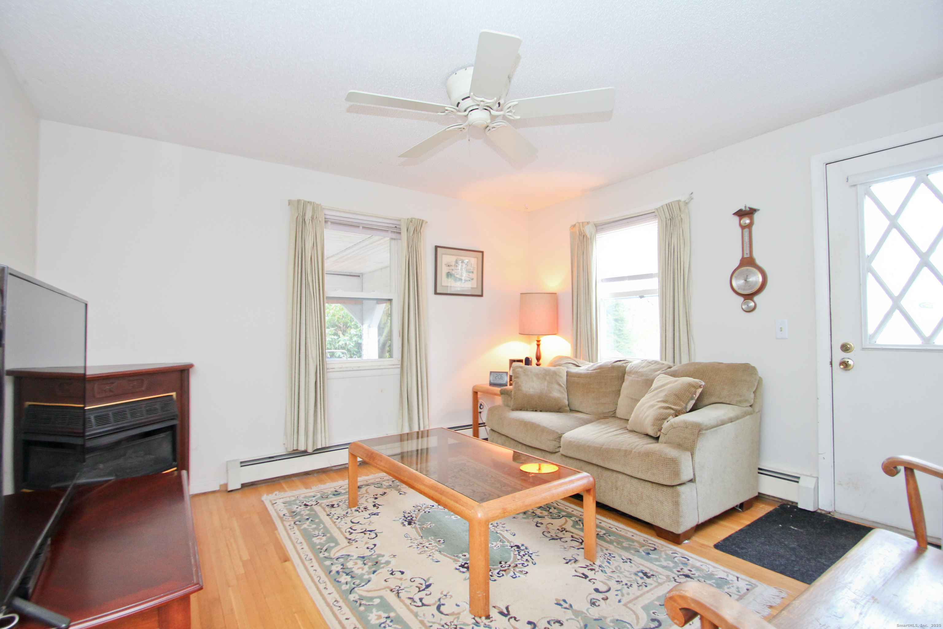 11 Northfield Road Enfield, CT 06082 - Photo 16 of 34 a living room with furniture and a window