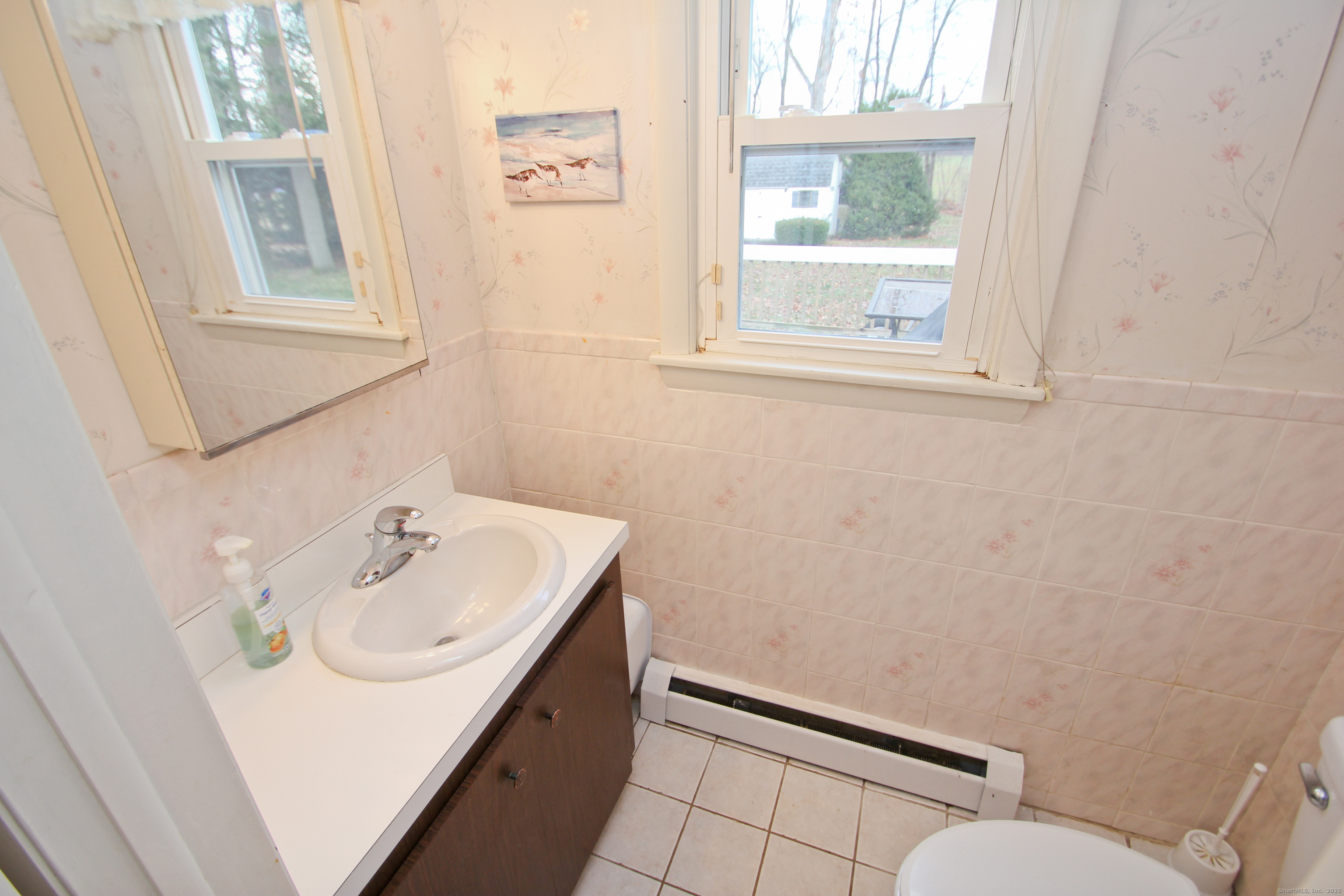 11 Northfield Road Enfield, CT 06082 - Photo 20 of 34 a bathroom with a sink and a toilet