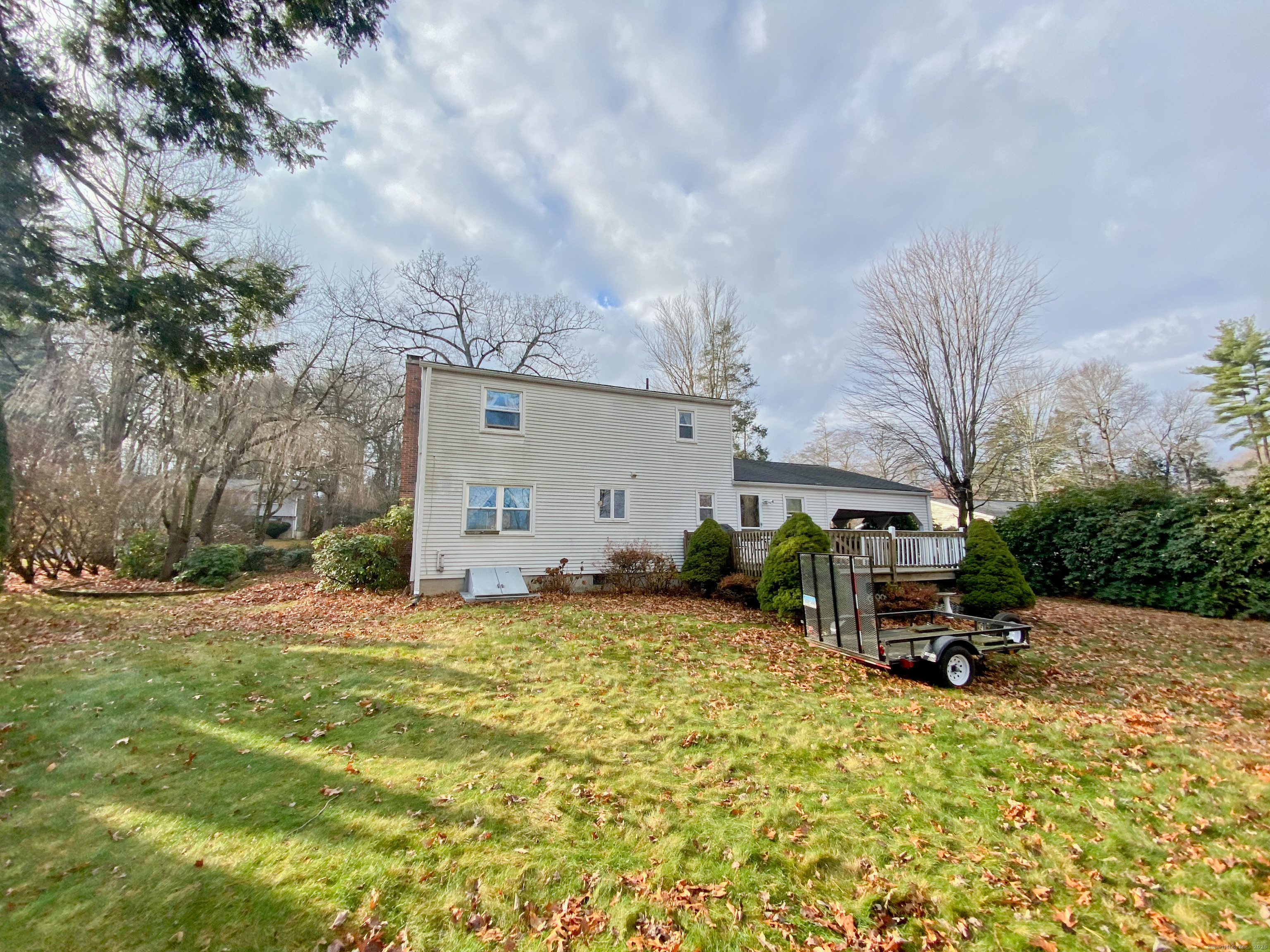 11 Northfield Road Enfield, CT 06082 - Photo 29 of 34 a backyard of a house with table and chairs