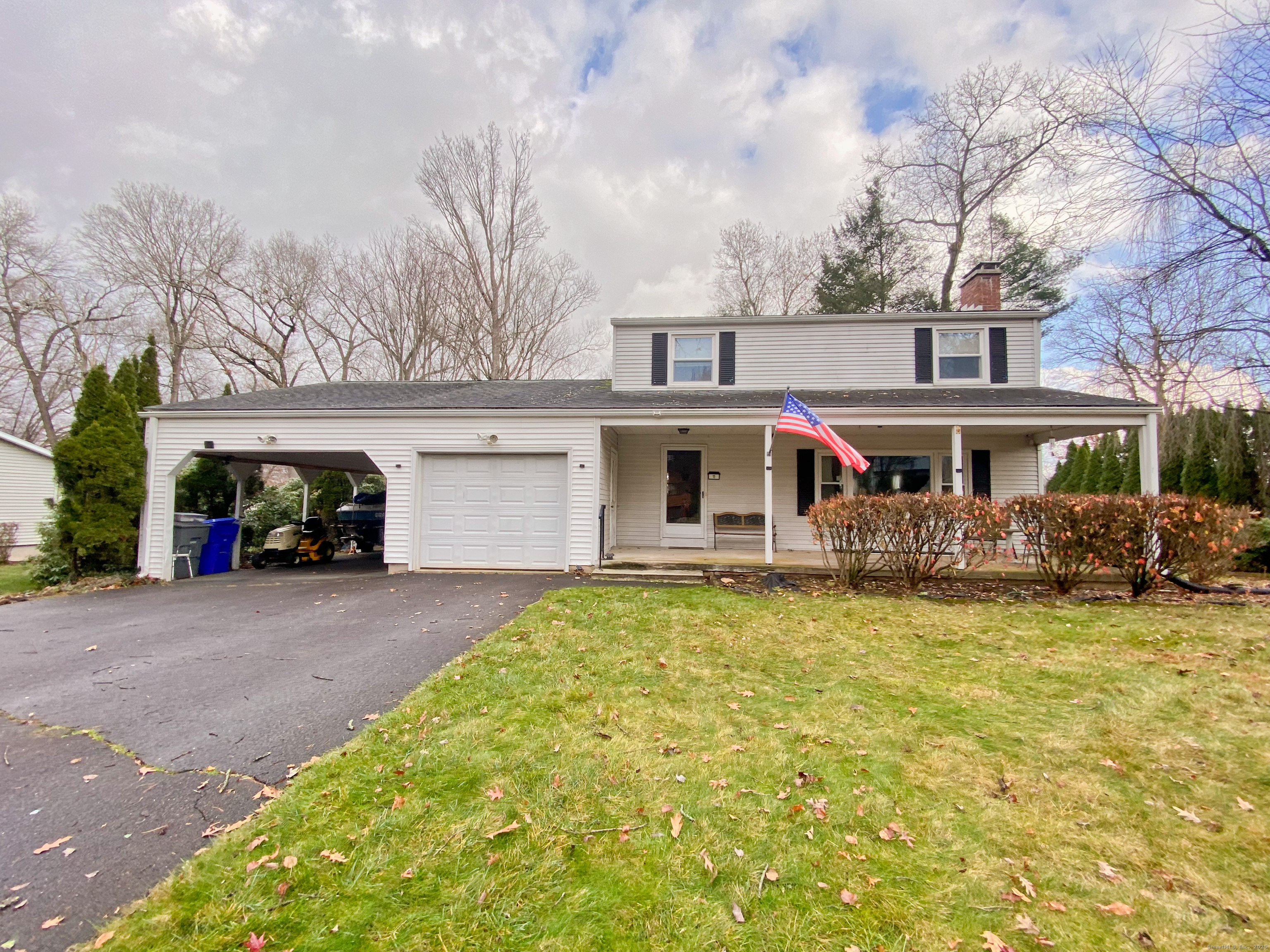11 Northfield Road Enfield, CT 06082 - Photo 34 of 34 a front view of a house with a garden and trees