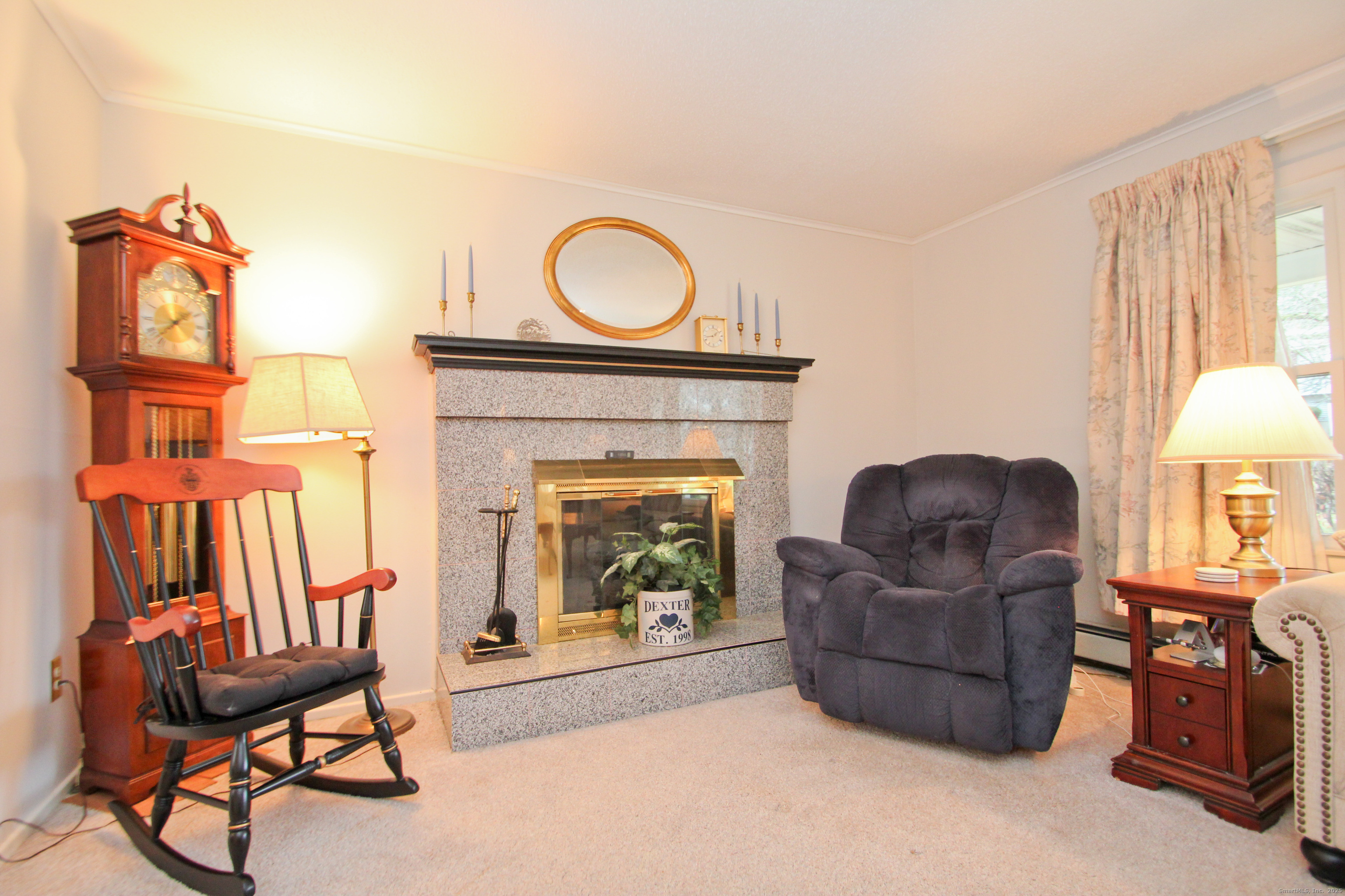 11 Northfield Road Enfield, CT 06082 - Photo 5 of 34 a living room with furniture and a fireplace