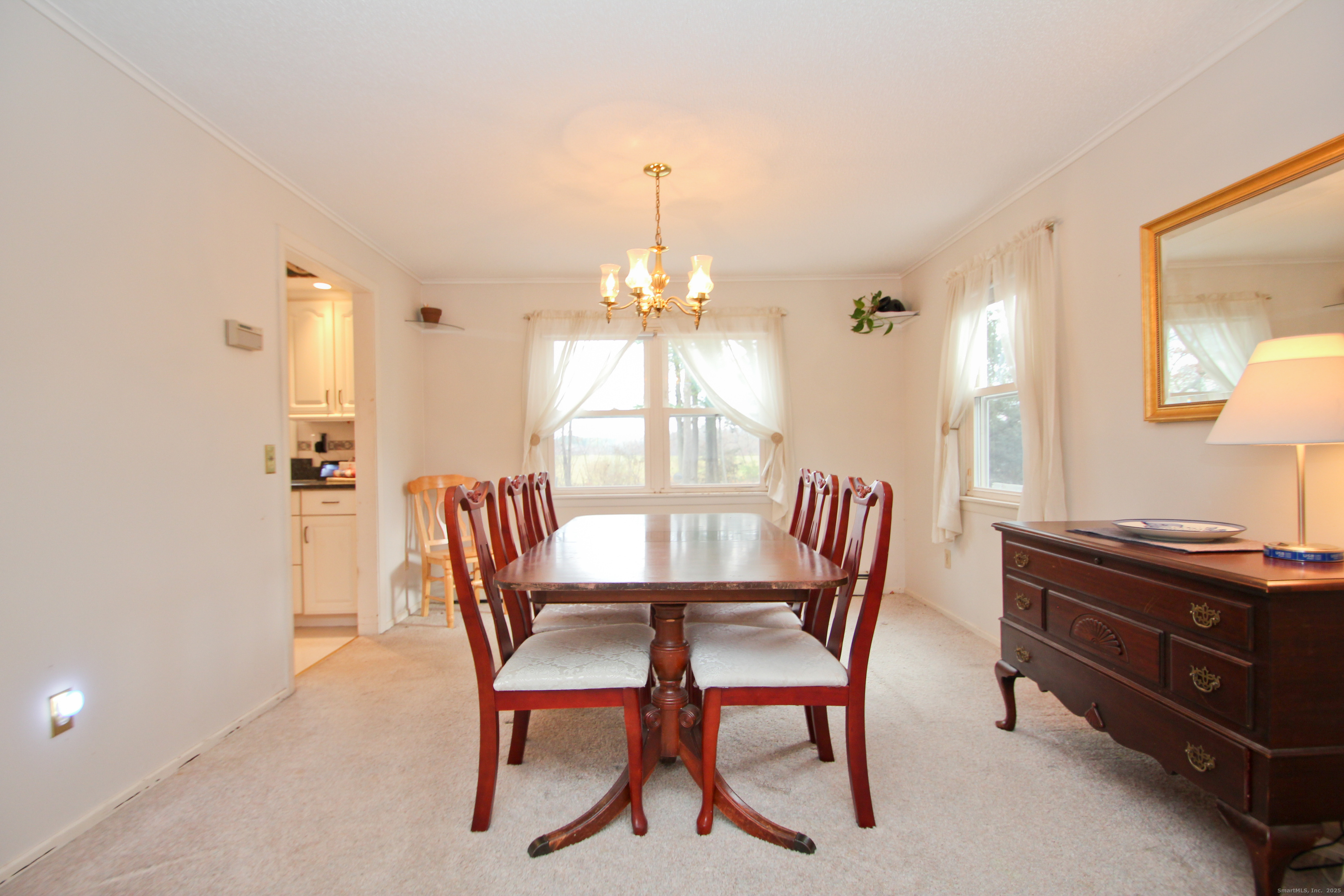 11 Northfield Road Enfield, CT 06082 - Photo 9 of 34 a dining room with furniture and window