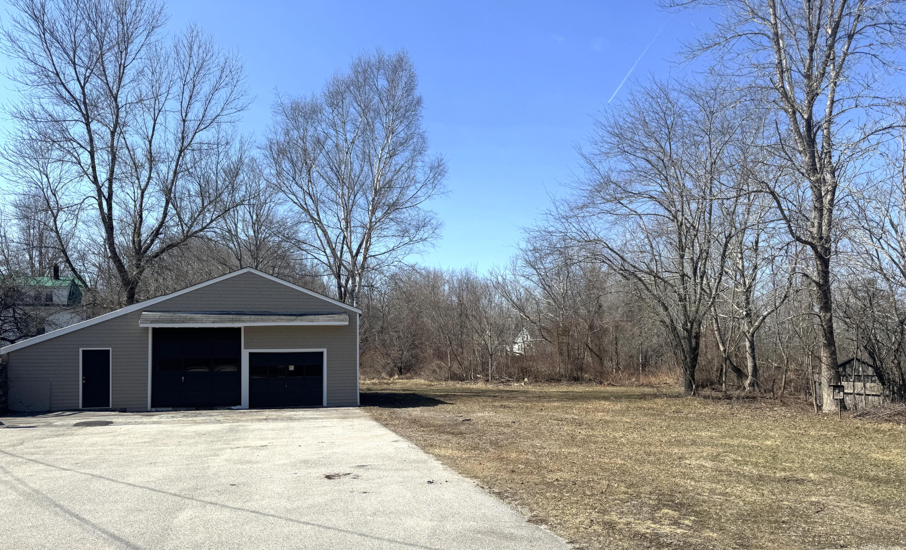 75 Gray Meadow Road Orland, ME 04472 - Photo 4 of 23 75 GM ext garage.side lot