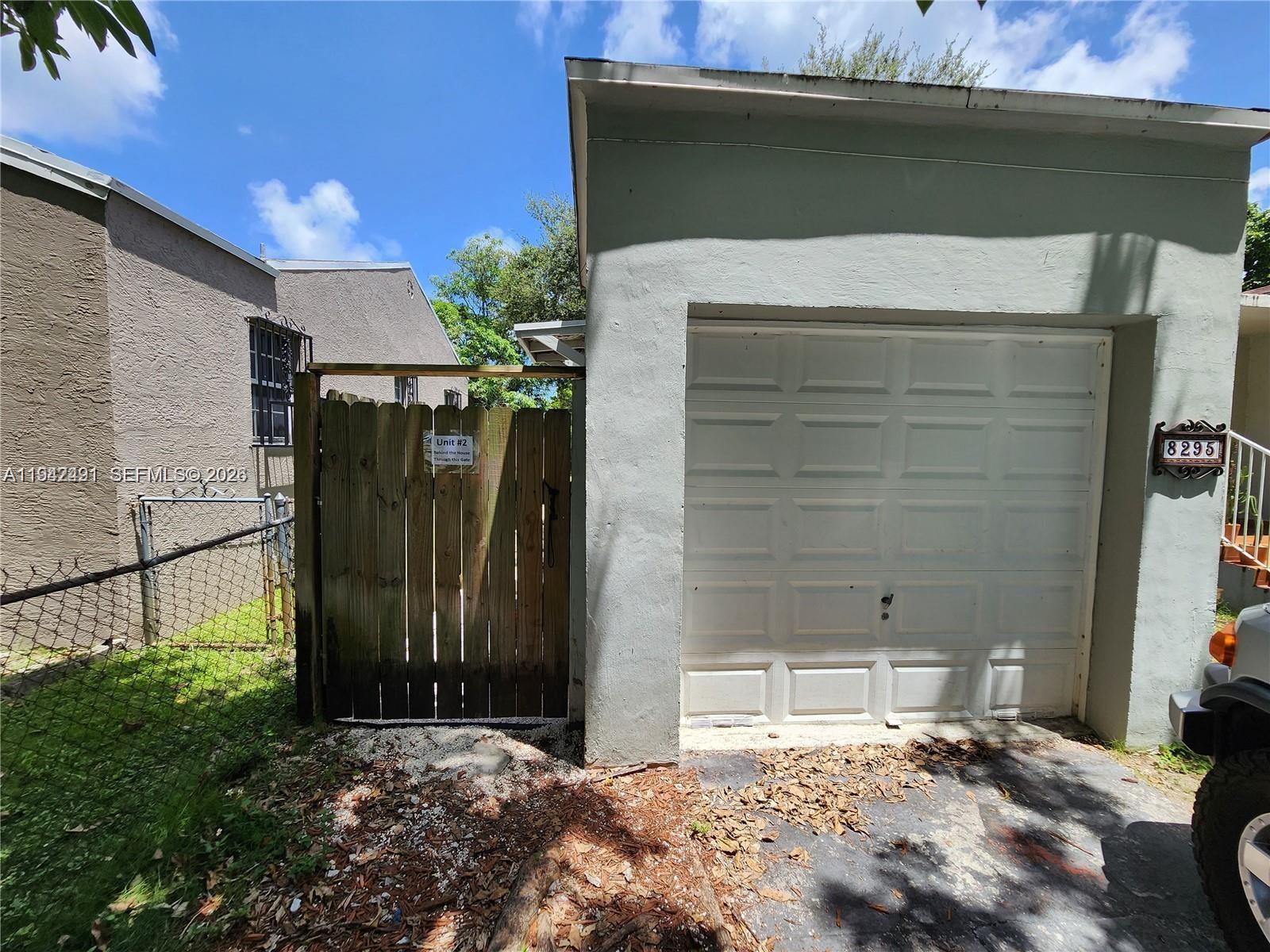 8295 Northeast 3rd Avenue, Unit 3 Miami, FL 33138 - Photo 5 of 7 a backyard of a house