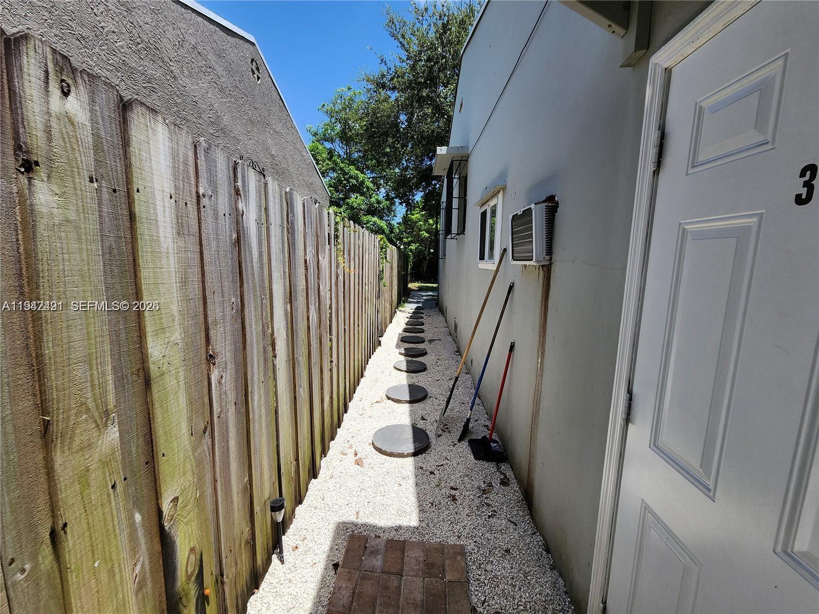 8295 Northeast 3rd Avenue, Unit 3 Miami, FL 33138 - Photo 6 of 7 a view of wooden balcony