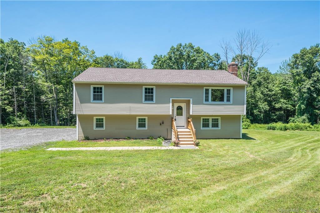 119 Stiles Road Southbury, CT 06488 - Photo 1 of 1 a view of a house with a yard
