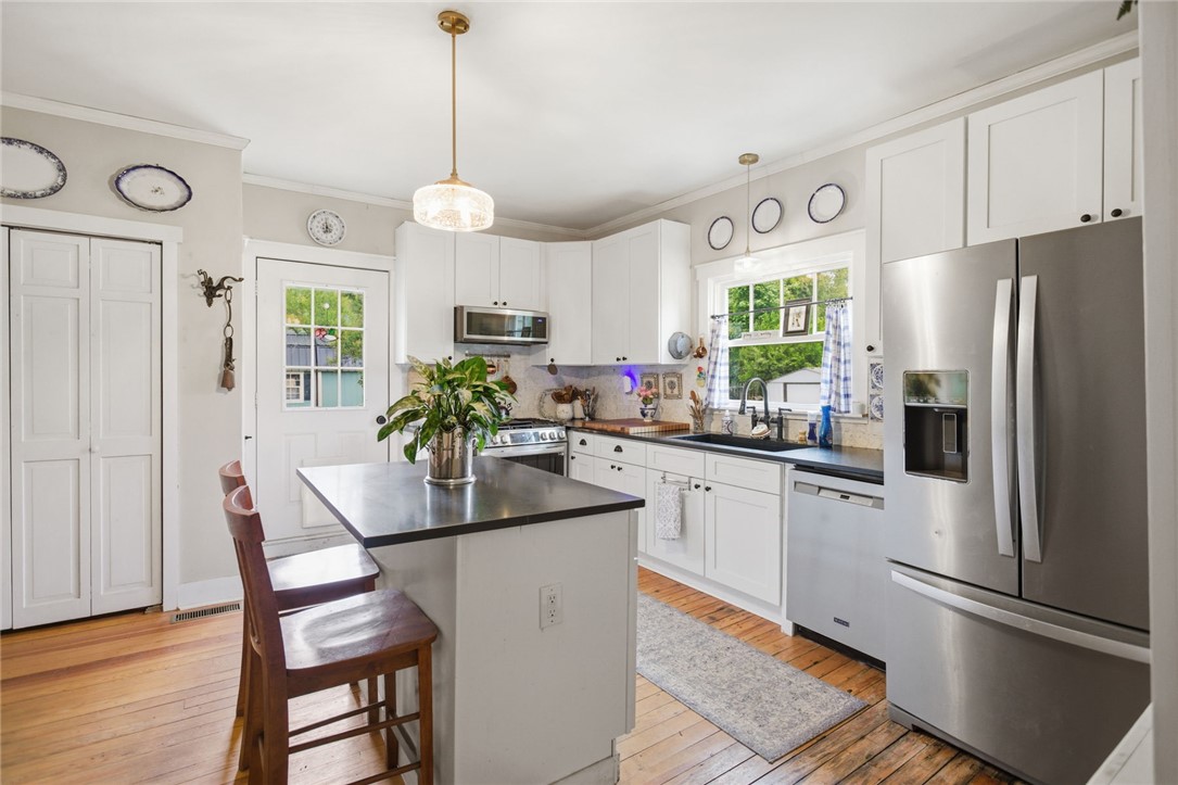 314 South Fairplay Street Seneca, SC 29678 - Photo 11 of 50 This bright kitchen features ample counter space and modern appliances, perfect for everyday living.