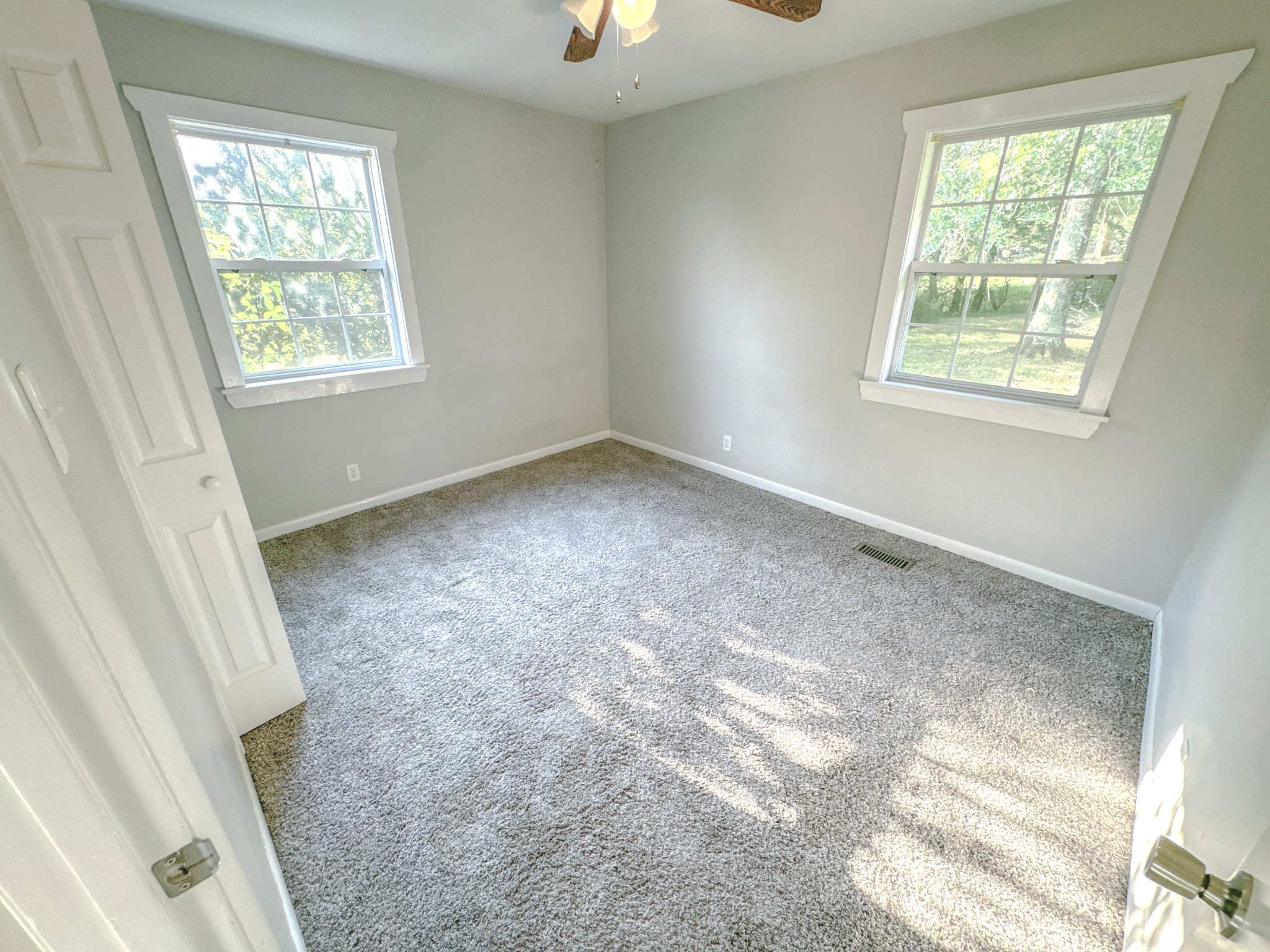 7 Switchboard Road Brush Creek, TN 38547 - Photo 12 of 20 a view of room with hardwood floor and window