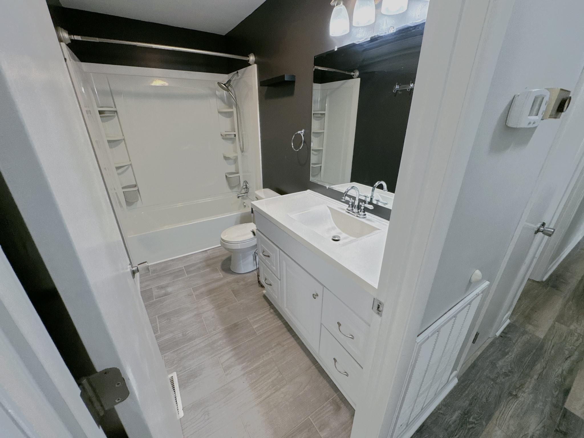 7 Switchboard Road Brush Creek, TN 38547 - Photo 13 of 20 a bathroom with a bathtub sink and toilet