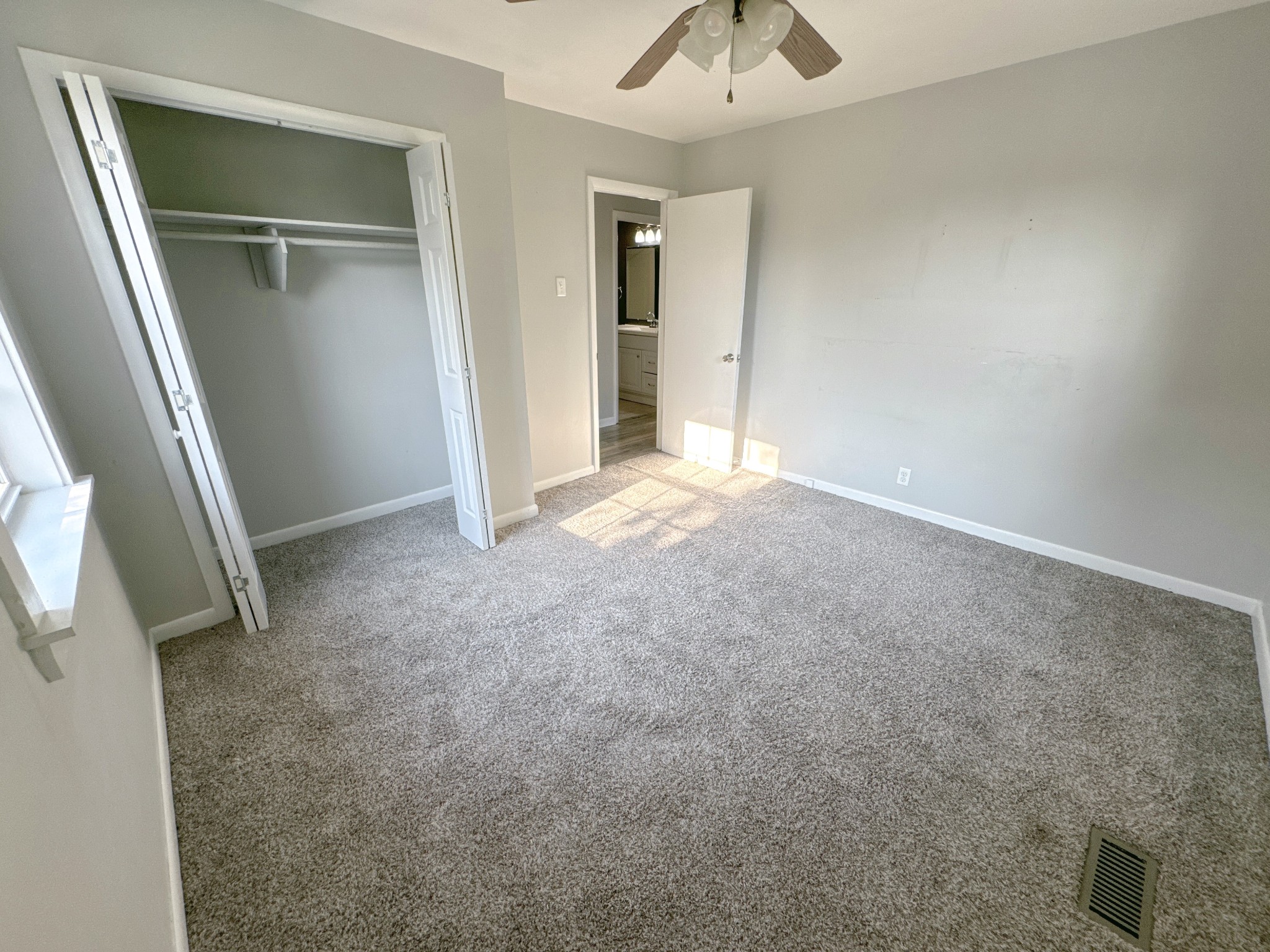 7 Switchboard Road Brush Creek, TN 38547 - Photo 15 of 20 an empty room with closet and windows