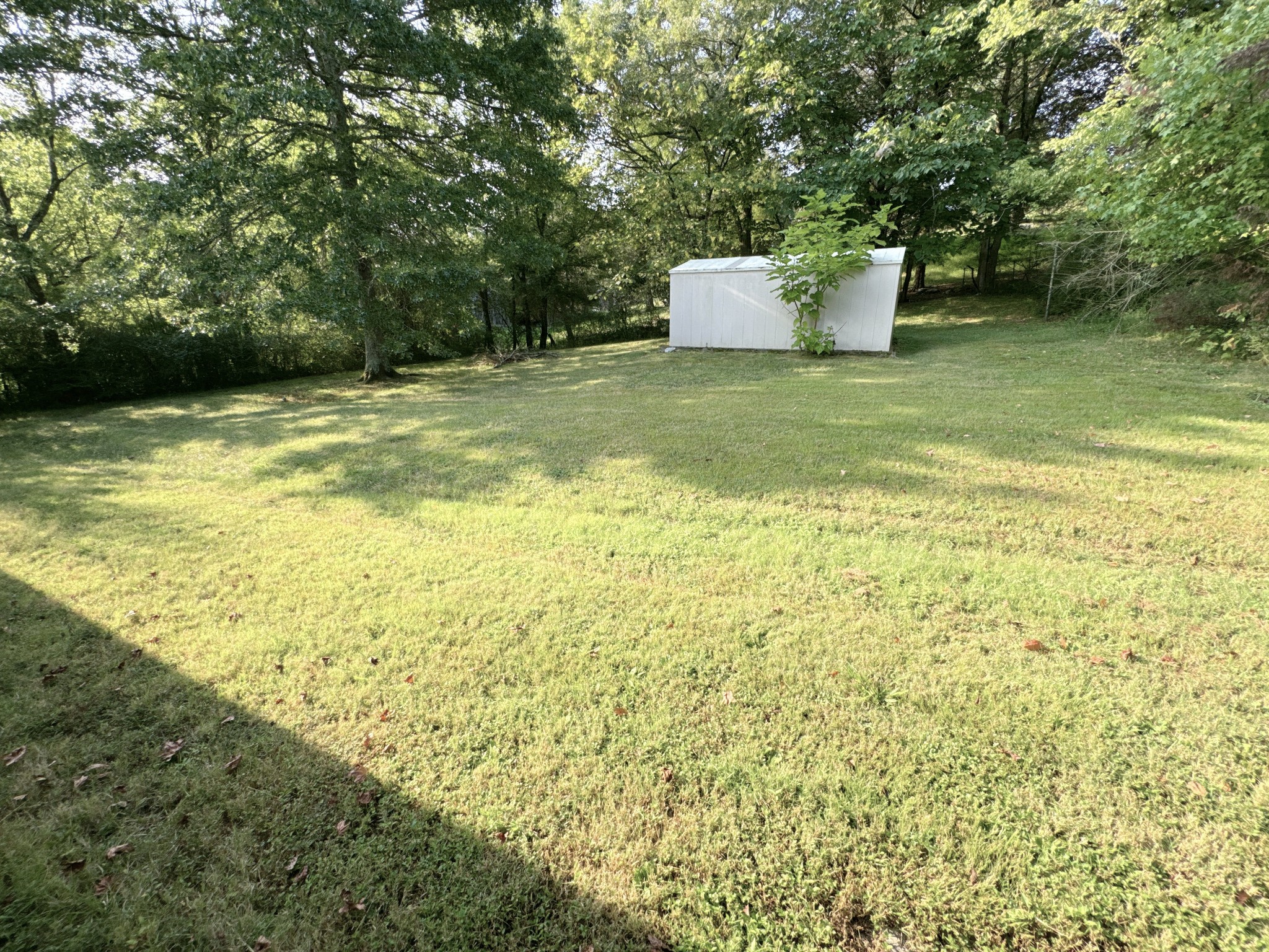 7 Switchboard Road Brush Creek, TN 38547 - Photo 16 of 20 a view of a water fountain and a floor to ceiling window