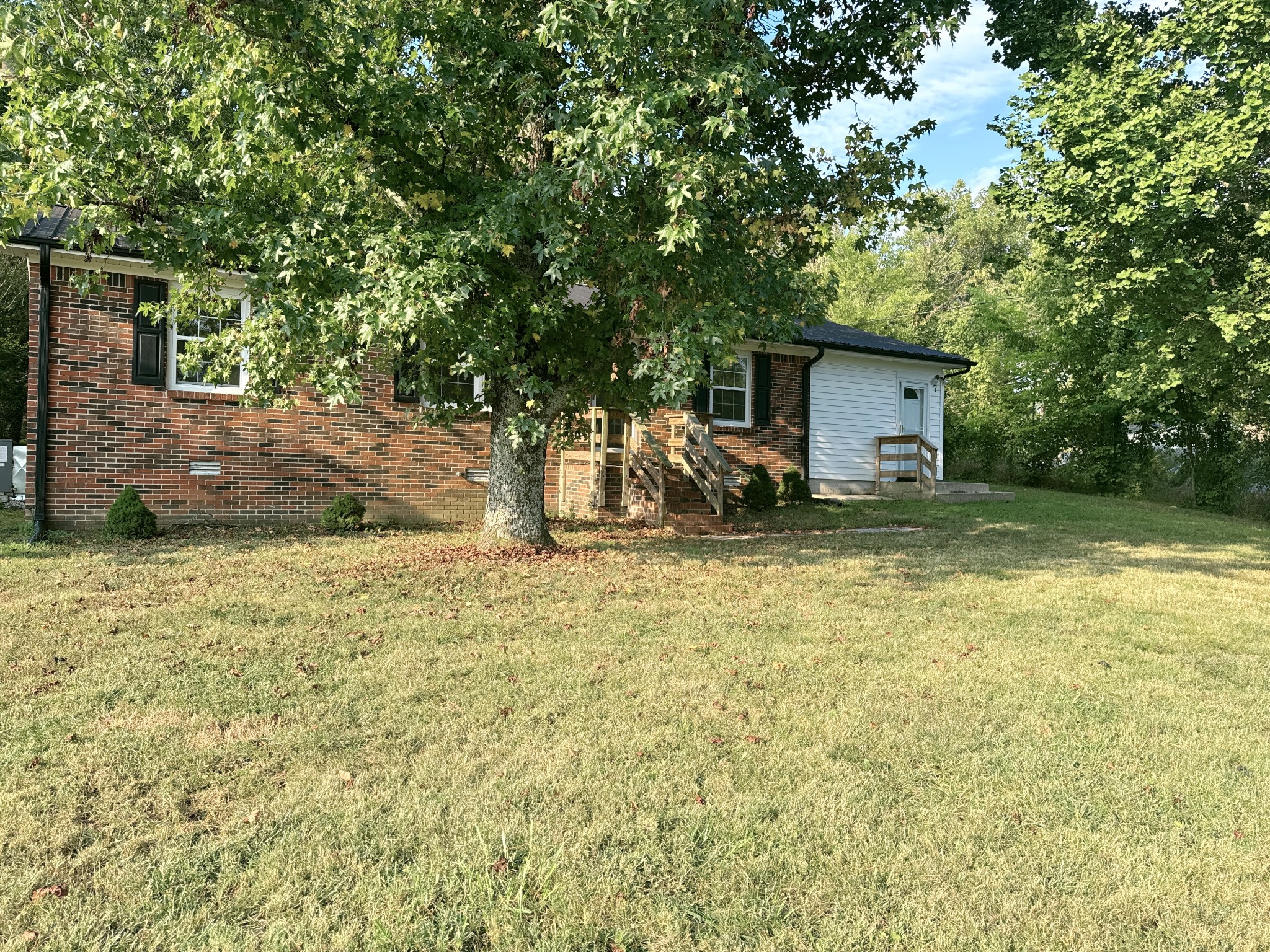 7 Switchboard Road Brush Creek, TN 38547 - Photo 17 of 20 a view of a backyard
