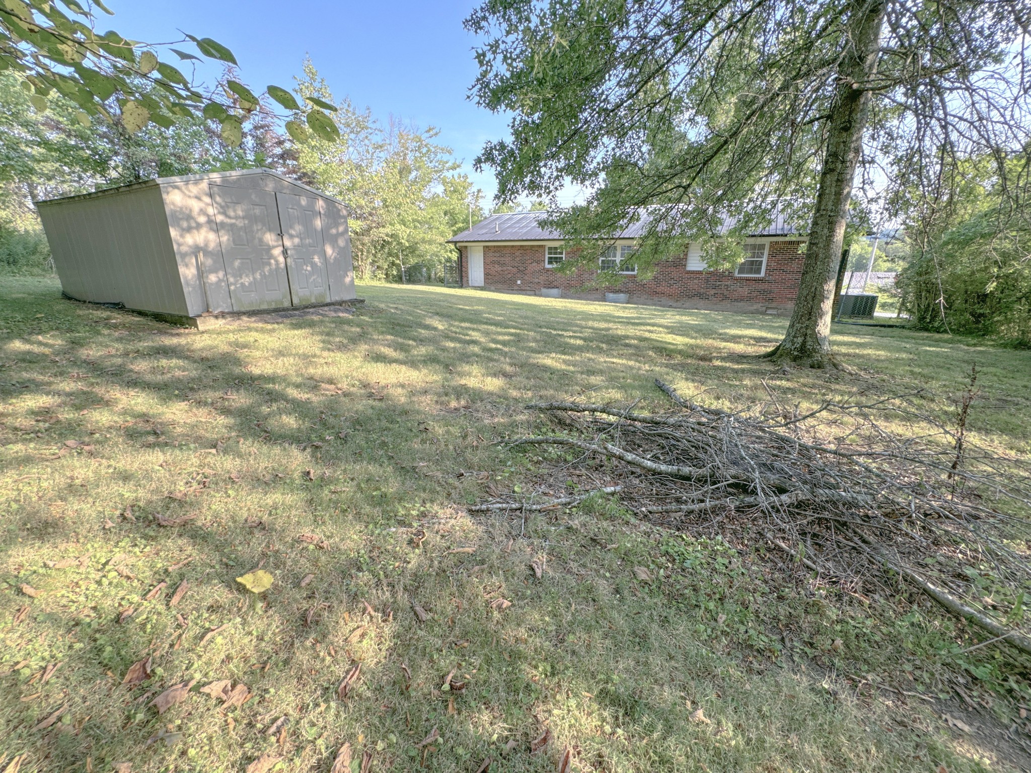 7 Switchboard Road Brush Creek, TN 38547 - Photo 19 of 20 a view of a yard with large trees