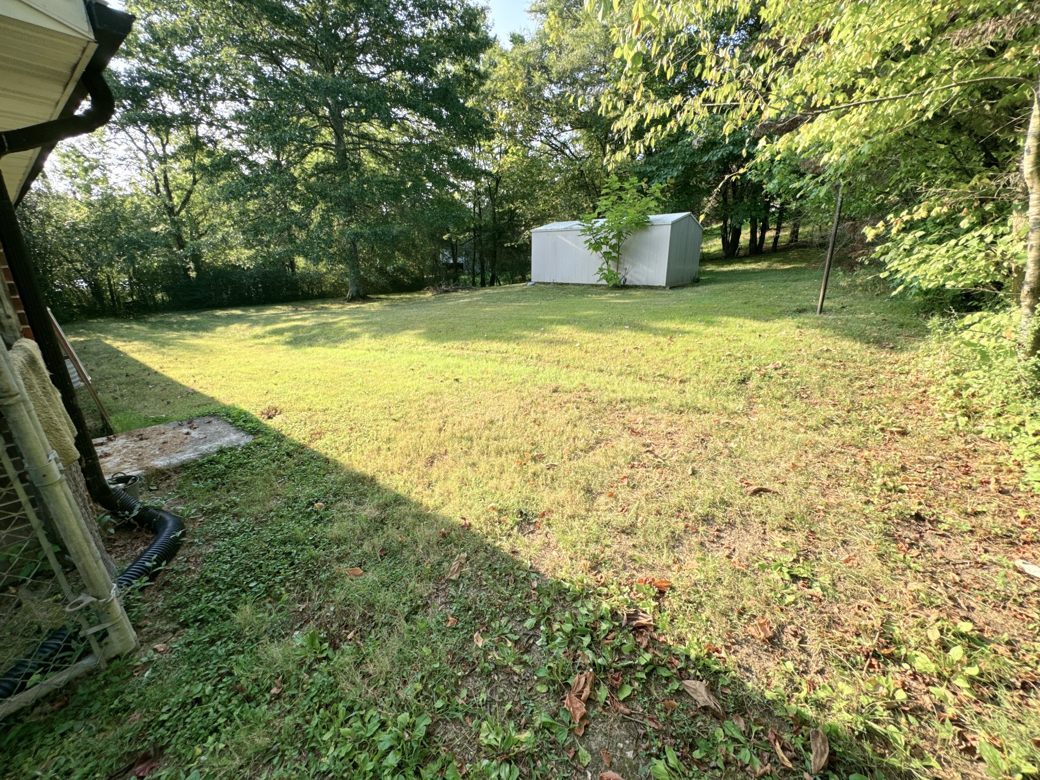 7 Switchboard Road Brush Creek, TN 38547 - Photo 4 of 20 a view of a swimming pool with an outdoor space and seating area