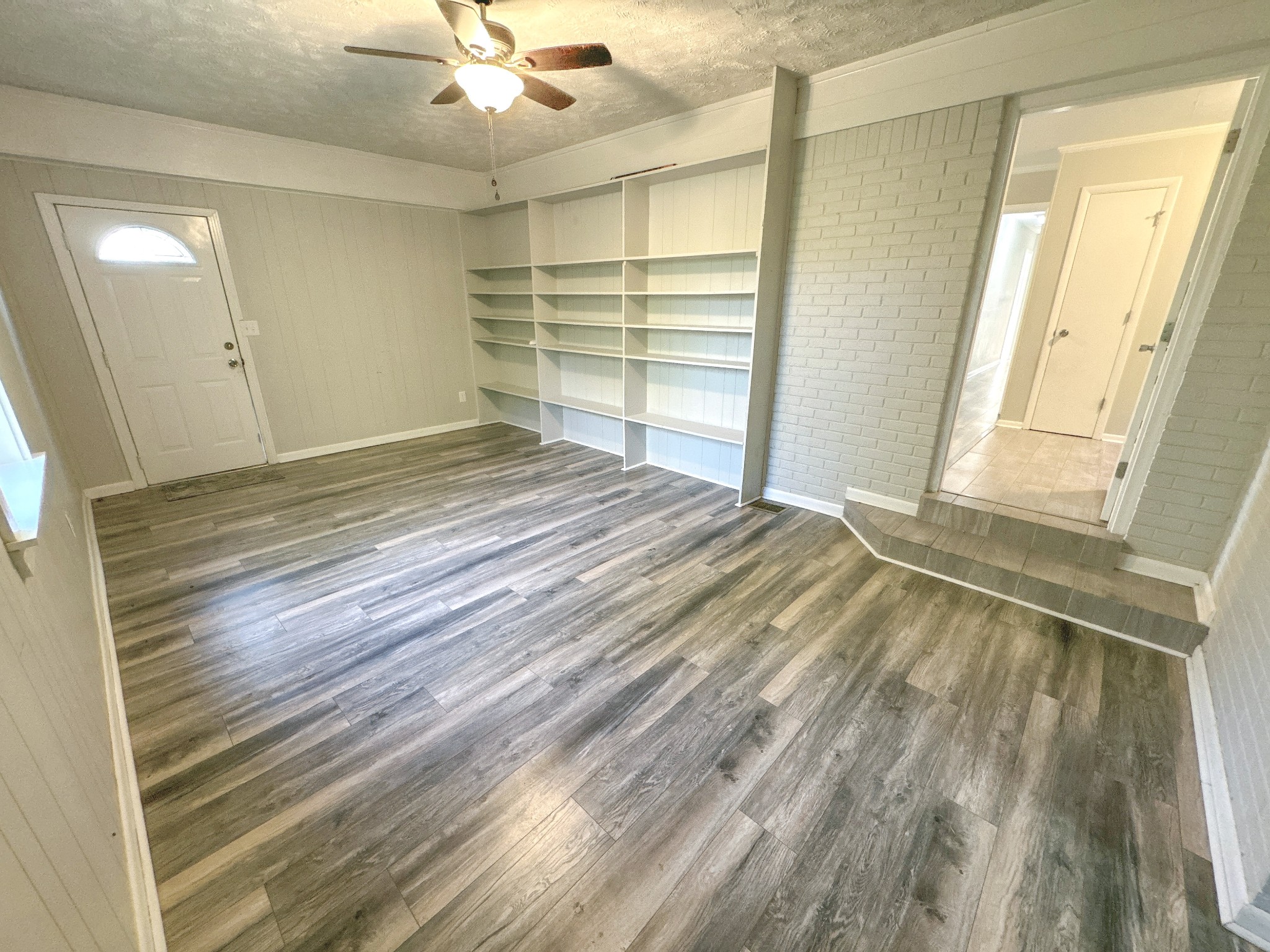 7 Switchboard Road Brush Creek, TN 38547 - Photo 9 of 20 a view of empty room with wooden floor and fan