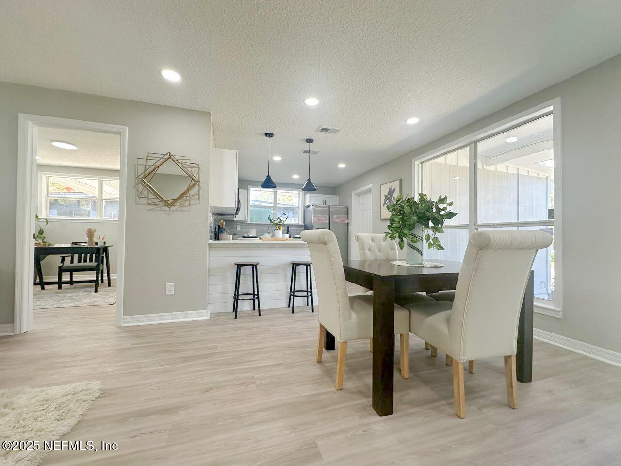 1336 Morgana Road Jacksonville, FL 32211 - Photo 11 of 36 a kitchen with a table and chairs in it