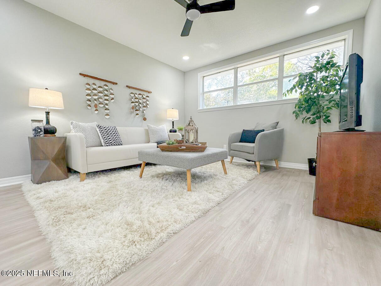 1336 Morgana Road Jacksonville, FL 32211 - Photo 15 of 36 a living room with furniture and a large window