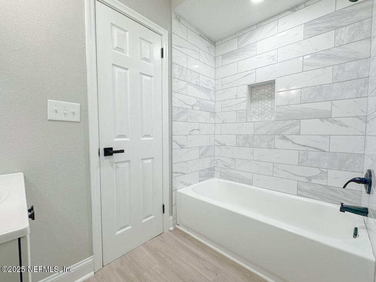 1336 Morgana Road Jacksonville, FL 32211 - Photo 21 of 36 a bathroom with a bathtub