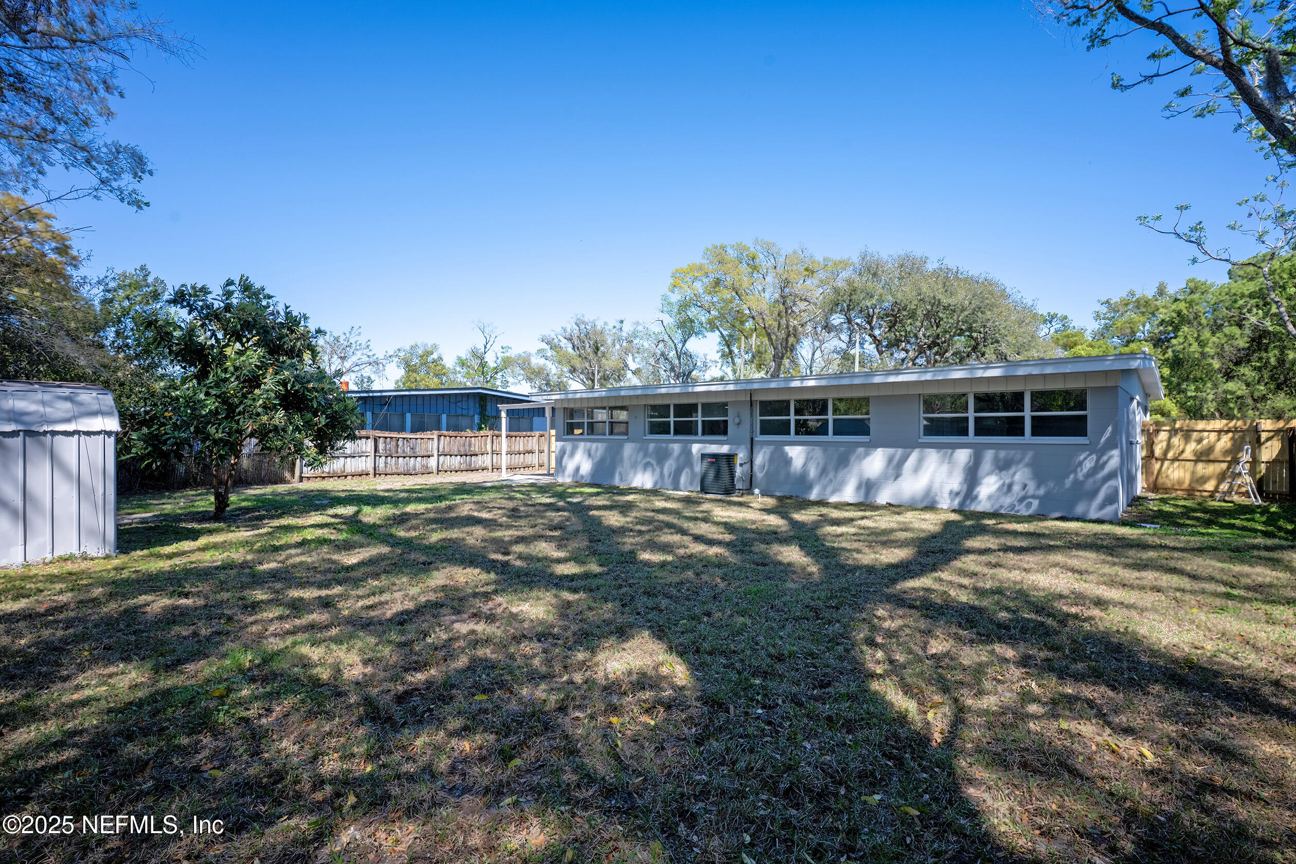 1336 Morgana Road Jacksonville, FL 32211 - Photo 34 of 36 a view of a house with backyard and sitting area