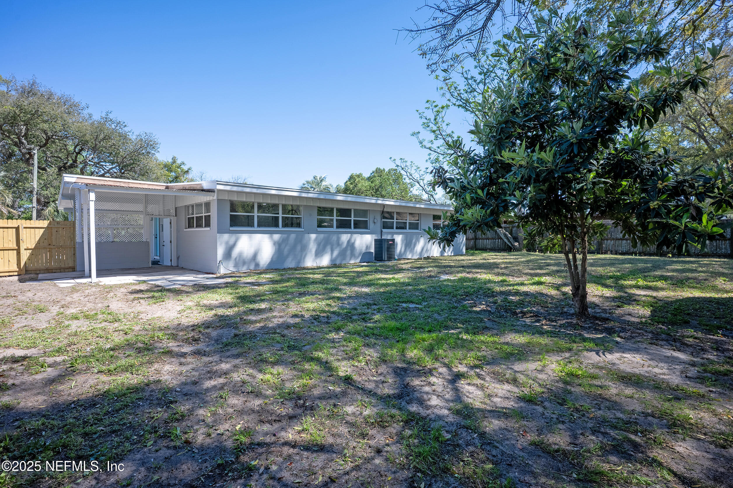 1336 Morgana Road Jacksonville, FL 32211 - Photo 36 of 36 a view of a house with yard and sitting area