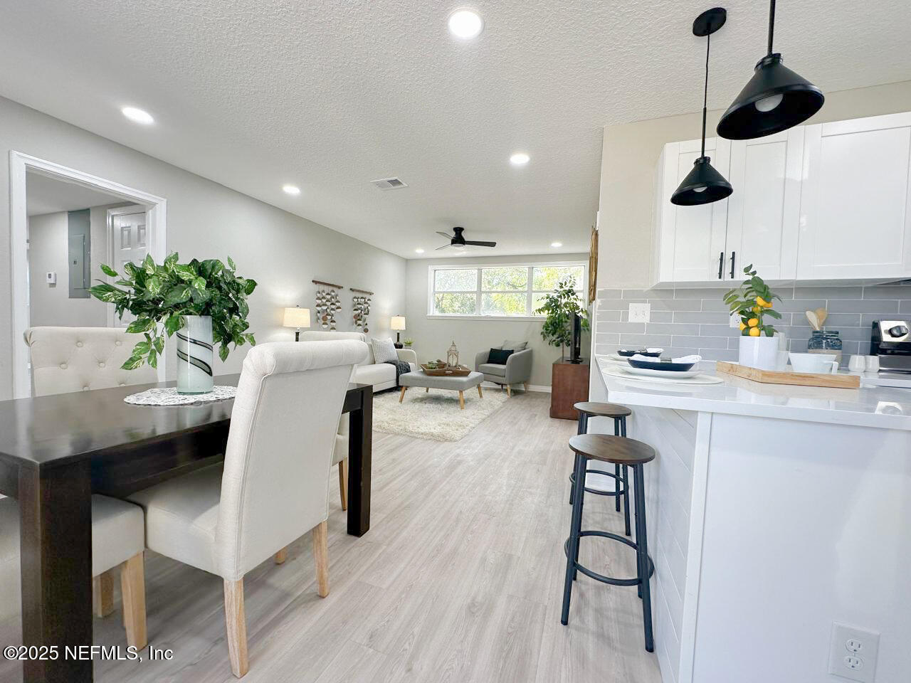 1336 Morgana Road Jacksonville, FL 32211 - Photo 9 of 36 a kitchen with a table and chairs in it