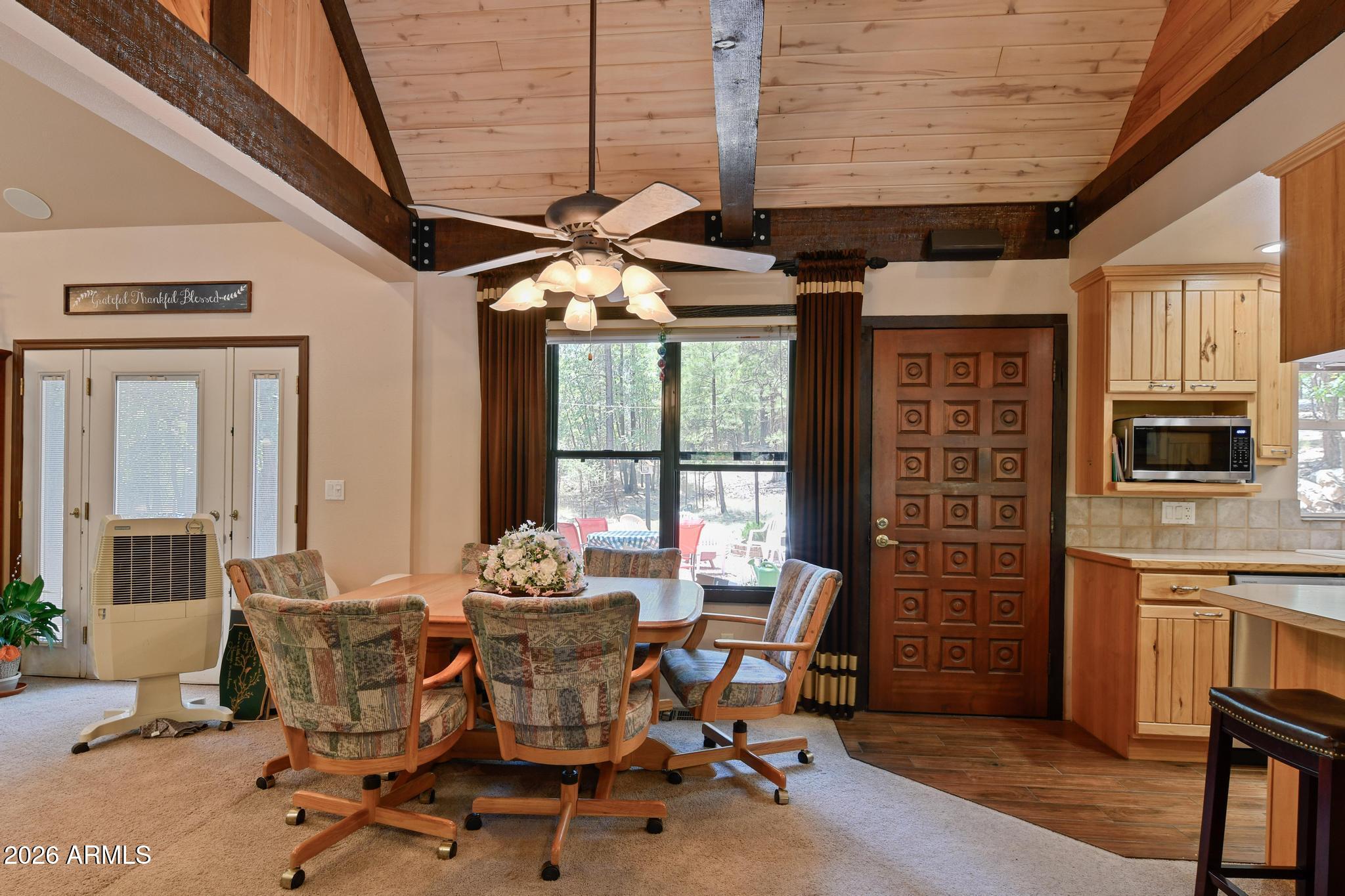 1018 Reata Pass Happy Jack, AZ 86024 - Photo 12 of 33 a dining room with furniture and window