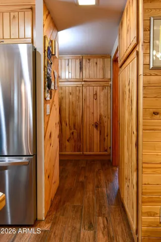 a view of a door with wooden floor