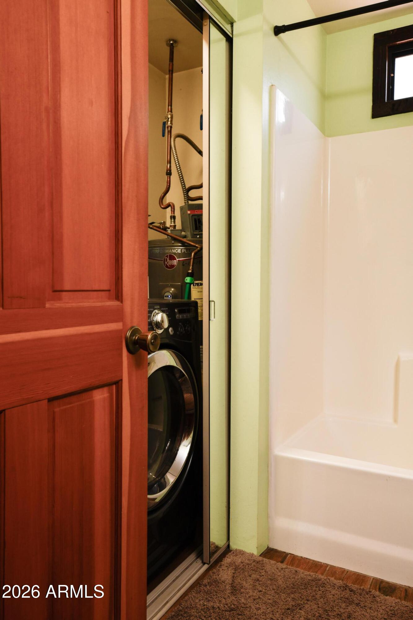 1018 Reata Pass Happy Jack, AZ 86024 - Photo 22 of 33 a bathroom with a bathtub and a shower
