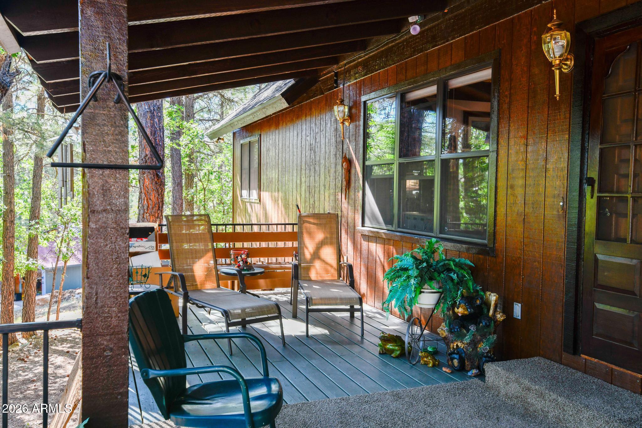 1018 Reata Pass Happy Jack, AZ 86024 - Photo 4 of 33 a outdoor living space with furniture