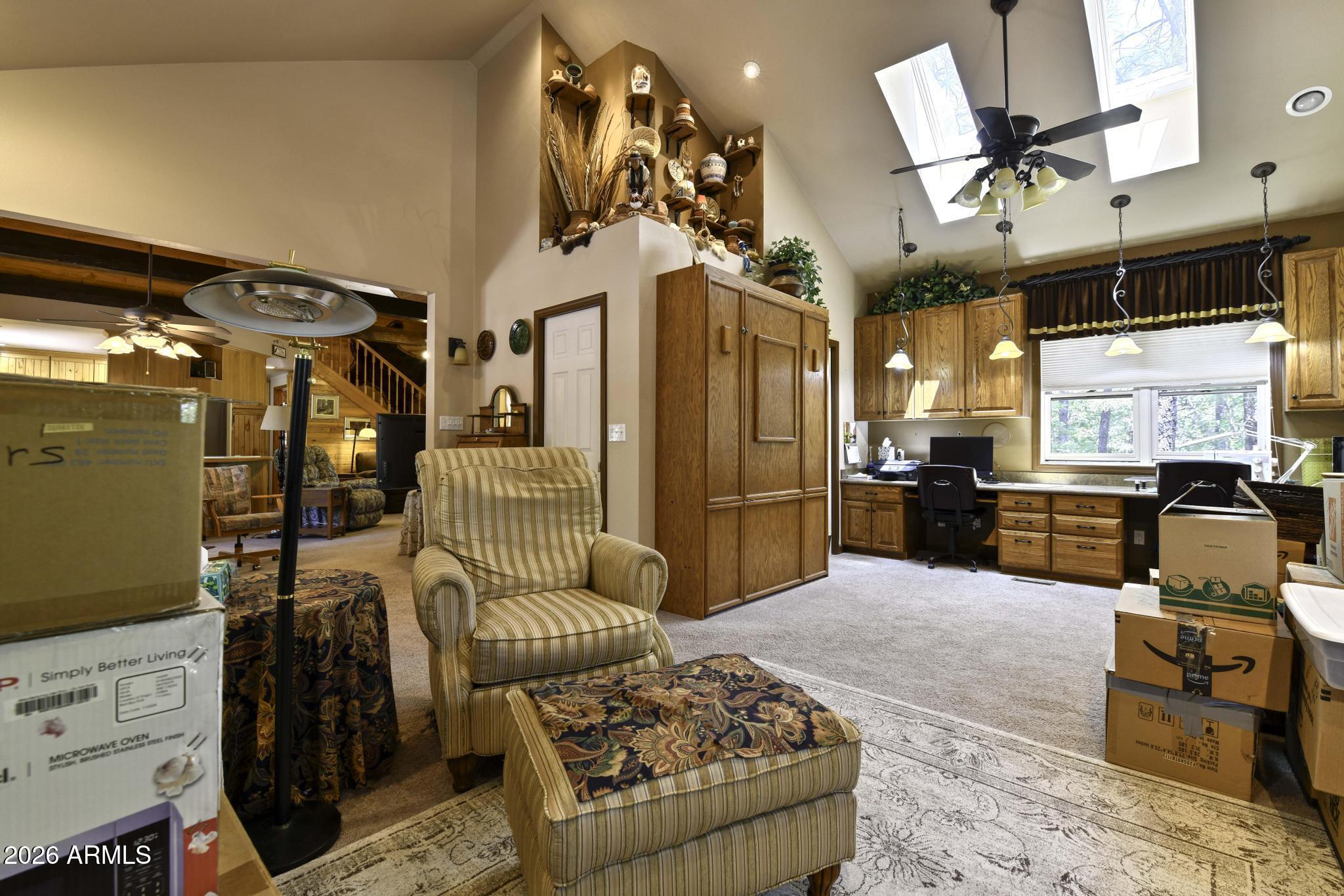 1018 Reata Pass Happy Jack, AZ 86024 - Photo 5 of 33 a living room with furniture and a flat screen tv