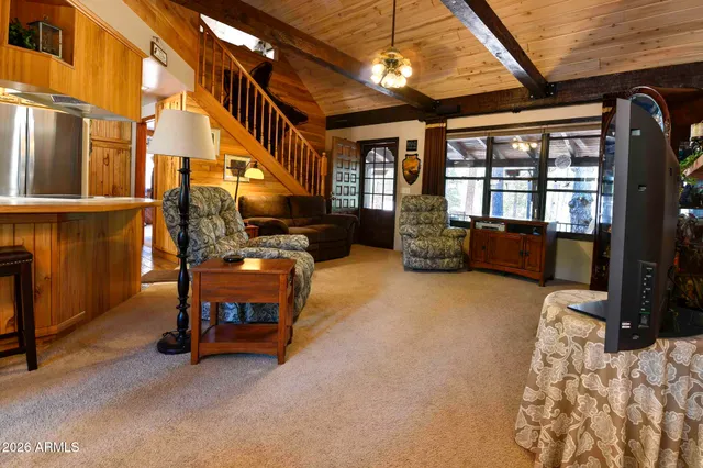 a view of livingroom with furniture and windows
