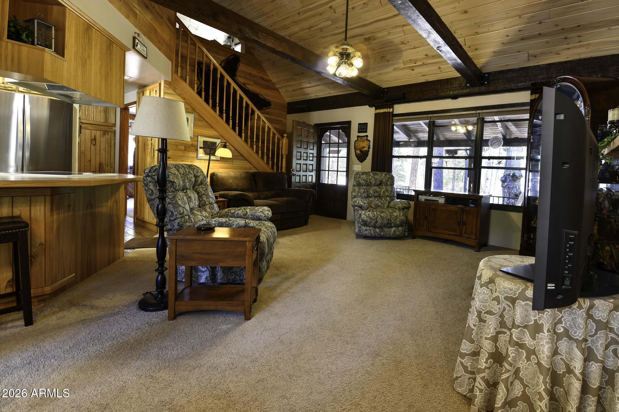 1018 Reata Pass Happy Jack, AZ 86024 - Photo 6 of 33 a view of livingroom with furniture and windows