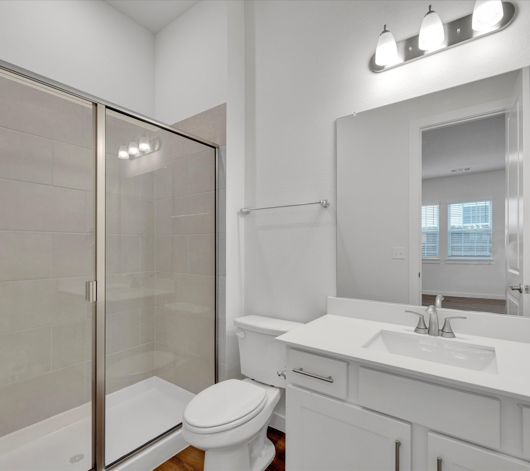 2709-802 Rockhill Road McKinney, TX 75072 - Photo 11 of 14 a bathroom with a sink toilet and shower