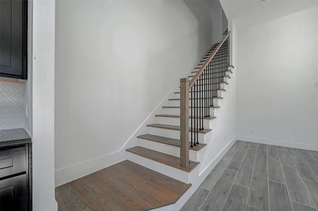 a view of entryway with wooden floor
