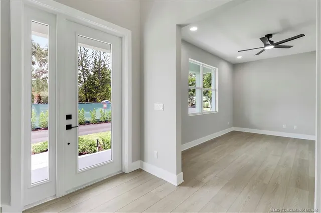 a kitchen with stainless steel appliances granite countertop a stove and a refrigerator
