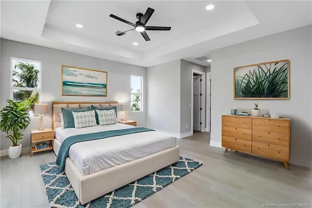 a view of an empty room and wooden floor