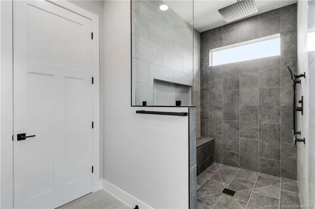 a view of a balcony dining table and chairs with wooden floor